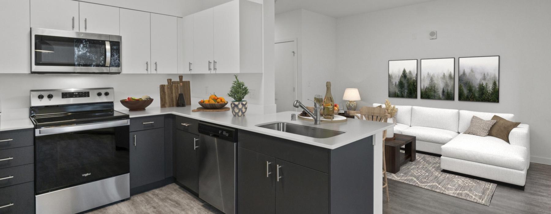 a kitchen with a couch and a sink